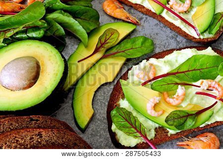 Toasts With Avocado Paste And Shrimp. Open Sandwiches With Shrimp And Avocado. Keto Diet Concept. Sa
