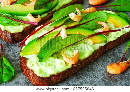 Toasts With Avocado Paste And Shrimp. Open Sandwiches With Shrimp And Avocado. Keto Diet Concept. Sa