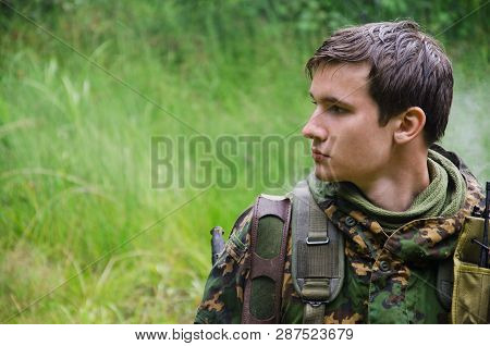 Guy In Uniform In Profile In Natyre