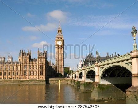 Morning Shot Of Big Ben And A Red Double Decker Bus, Londo