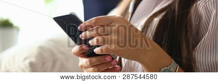 Minsk, Belarus - February 16, 2019 : Woman Holding Smartphone Samsung Galaxy S8 In Hand Illustrative