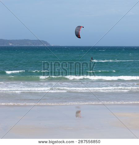 View Of Kite Surfer From Beach Shore