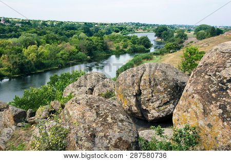 Stone Boulders On Bank Of  Southern Bug River In  Summer On Sunny Day In  Reserve Buzsky Gard, Migey