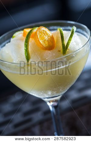 Cocktail Drink Frozen Margarita At Barcounter In Night Club Or Restaurant.