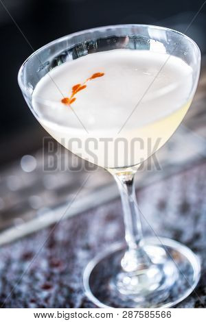 Cocktail Drink Pisco Sour At Barcounter In Night Club Or Restaurant.