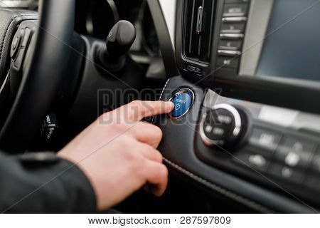 Car Driver Starting The Engine Start, Stop Engine Button.