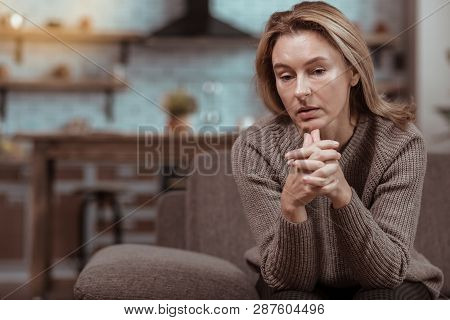 Mature Woman Feeling Depressed Thinking About Husband Cheating