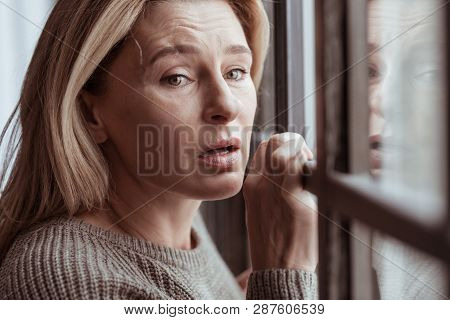 Blonde-haired Woman Feeling Stressed Bursting Into Tears
