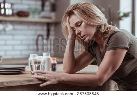 Woman Taking Too Many Sleeping Pills Thinking About Suicide