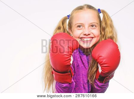 Self Defence Concept. Girl Child Strong With Boxing Gloves Posing On White Background. She Ready To 