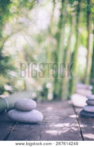 Spa Background With Woman's Hands And Clear Water On An Old Wooden Table. Japanese Style. Simplicity