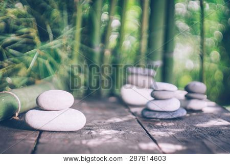 Spa Background With Woman's Hands And Clear Water On An Old Wooden Table. Japanese Style. Simplicity