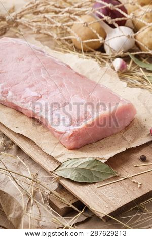 Raw Pork Meat - Carbonade Or Fillet. Fresh Meat And Ingredients. Rustic Style.