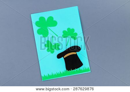 Diy St. Patricks Day Greeting Card Made Of Cardboard And Paper Clovers On A Gray Background. Gift Id
