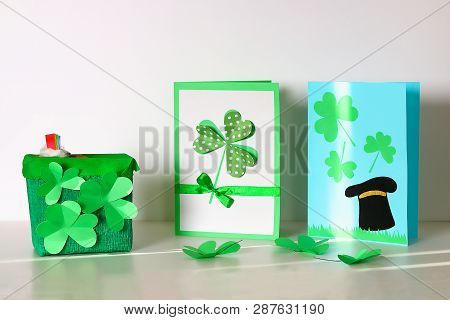 Diy St. Patricks Day Greeting Card Made Of Cardboard And Paper Clovers On A Gray Background. Gift Id