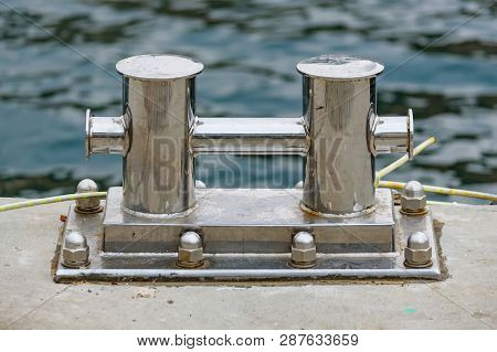 Close Up Stainless Steel Bollard Or Bitts In The Dock