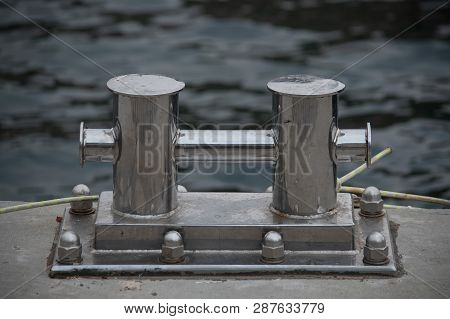 Close Up Stainless Steel Bollard Or Bitts In The Dock