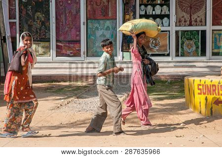 Ranthambore, India - February 4, 2011: Smiling Rajasthani Kids On Their Way Home From School. Rajast