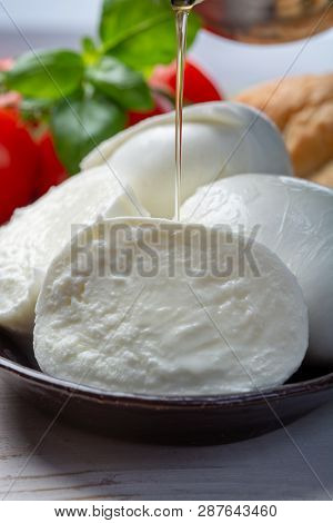 Balls And Pieces Of Buffalo Mozzarella, Soft Italian Scheese Made From The Milk Of Italian Mediterra