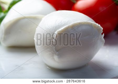 Balls Of Buffalo Mozzarella, Soft Italian Scheese Made From The Milk Of Italian Mediterranean Buffal