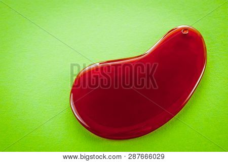 Guasha Scrapers For Body Massage According To The Ancient Method Shot On A Bright Green Background