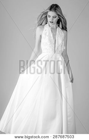 Fashion Model Or Princess At Prom. Wedding Fashion And Beauty Salon. Sexy Girl In White Dress With S