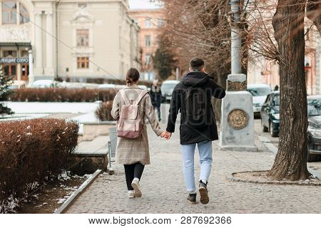 Wallking Together. Full Length Of Young Couple On Date Having Fun Together