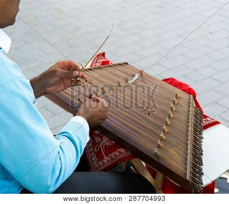 Santur Is A Percussion Instrument Of Persian / Iranic Origin. Played With Tiny Hammers