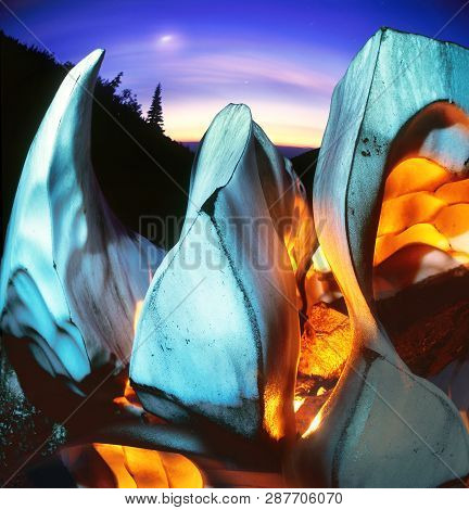 Sparkling Teeth Glacier Ice Under The Alpine Waterfall Is Shattered Remnant Ice Armor That Has Accum