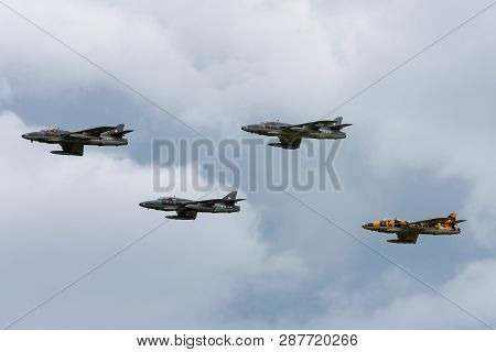 Payerne, Switzerland - September 1, 2014: Former Swiss Air Force Hawker Hunter T.68 Hb-rvw Leading A