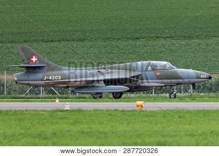 Payerne, Switzerland - September 1, 2014: Former Swiss Air Force Hawker Hunter T.68 Hb-rvw.