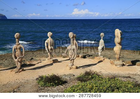 Stone Sculpture Of A Woman And Man In Can Picafort Majorca, Mallorca, Spain.