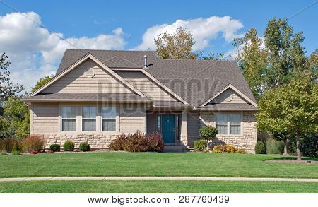 Tan House in Early Fall 