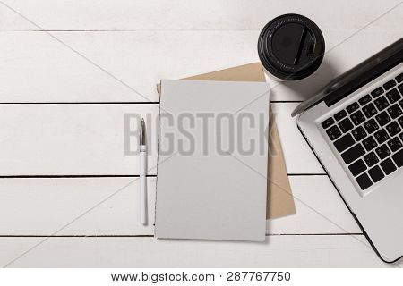 Mock-up Magazine Or Catalog On Wooden Table. Blank Page Or Notepad On Wood Background. Blank Page Or