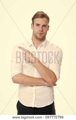 Check It Out. Man Well Groomed White Collar Shirt Isolated White Background Pointing Index Finger. A