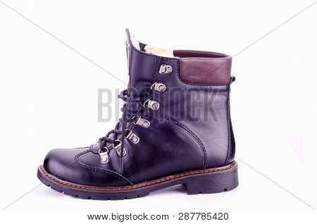 Beige Woman Long Boot Shoe Isolated On White Background. Fashionable Boots For Women May Exhibit All