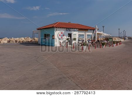 Zygi, Cyprus - November 7, 2018: View Of The Marina Cafe At Zygi.  Taken On A Bright Blue Sky Autumn
