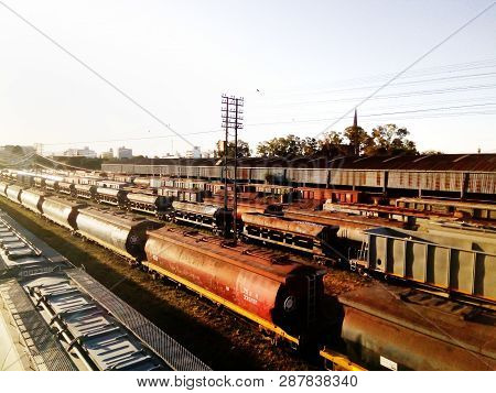 Old Abandoned And Disused Train Station At Sunset