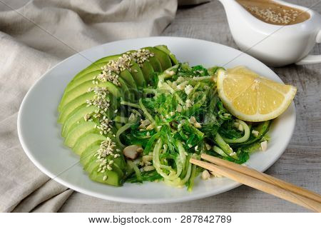 Chukka Salad, Cucumber Noodles With Avocado And Peanut Brown Sauce In Sauceboat
