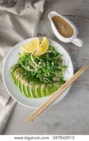 Chukka Salad, Cucumber Noodles With Avocado And Peanut Brown Sauce In Sauceboat