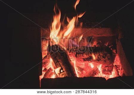 Vintage Look Coals And Fire. Blured Background Of Fire. Burning Coals