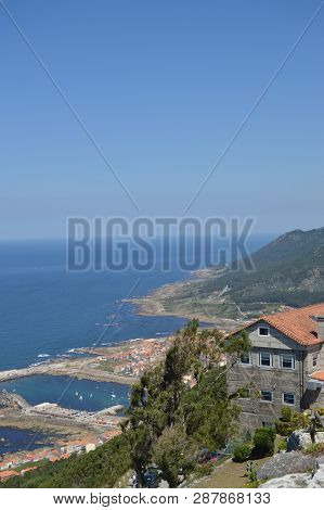 Views Of The Villa And The Harbor From The Castro De Santa Tecla In The Guard. Architecture, History