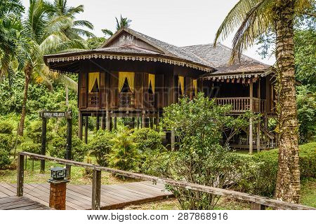 Kuching, Malaysia - November 22, 2017: Traditional Wooden Houses. Malay Town House In The Kuching To