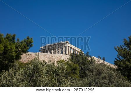 Acropolis Of Athens Greece Rock And Parthenon On Blue Sky Background, Sunny Day.