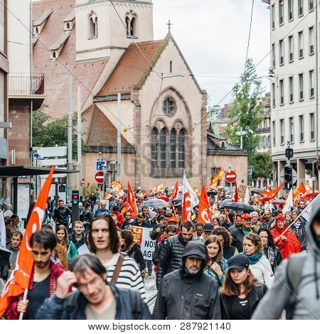 Strasbourg, France - Sep 12, 2017: Crowd With Paroisse Saint-nicolas Church As Political March Durin