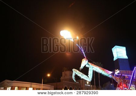 2/25/2019 Las Vegas, Nevada: Fire Breathing Music Playing Dancing Praying Mantis Sculpture on Freemont Street in Las Vegas Nevada. 
