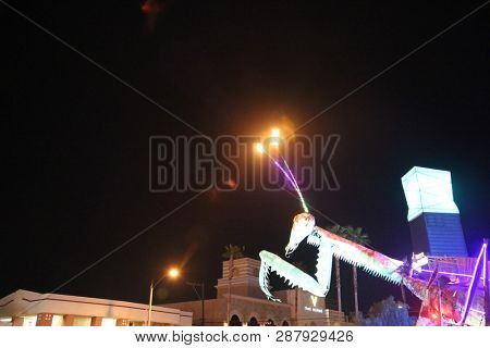 2/25/2019 Las Vegas, Nevada: Fire Breathing Music Playing Dancing Praying Mantis Sculpture on Freemont Street in Las Vegas Nevada. 
