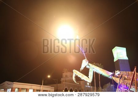 2/25/2019 Las Vegas, Nevada: Fire Breathing Music Playing Dancing Praying Mantis Sculpture on Freemont Street in Las Vegas Nevada. 
