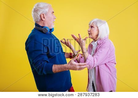 Couple Of Pensioners Having Extremely Emotional Conversation