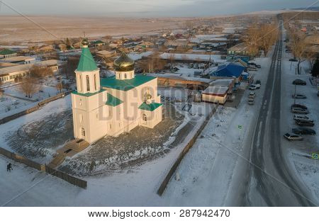 Aerial View On Siberian Village With Temple In Khakasia.